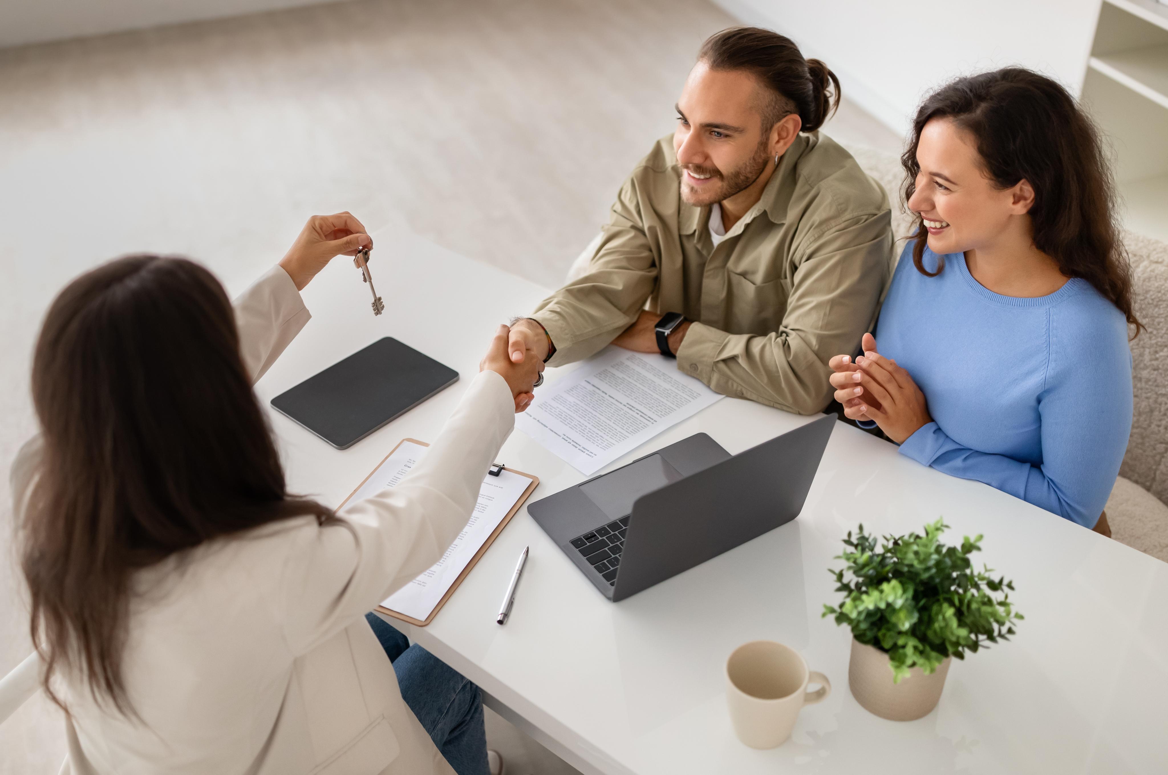 property specialist showcasing home deals to a bud