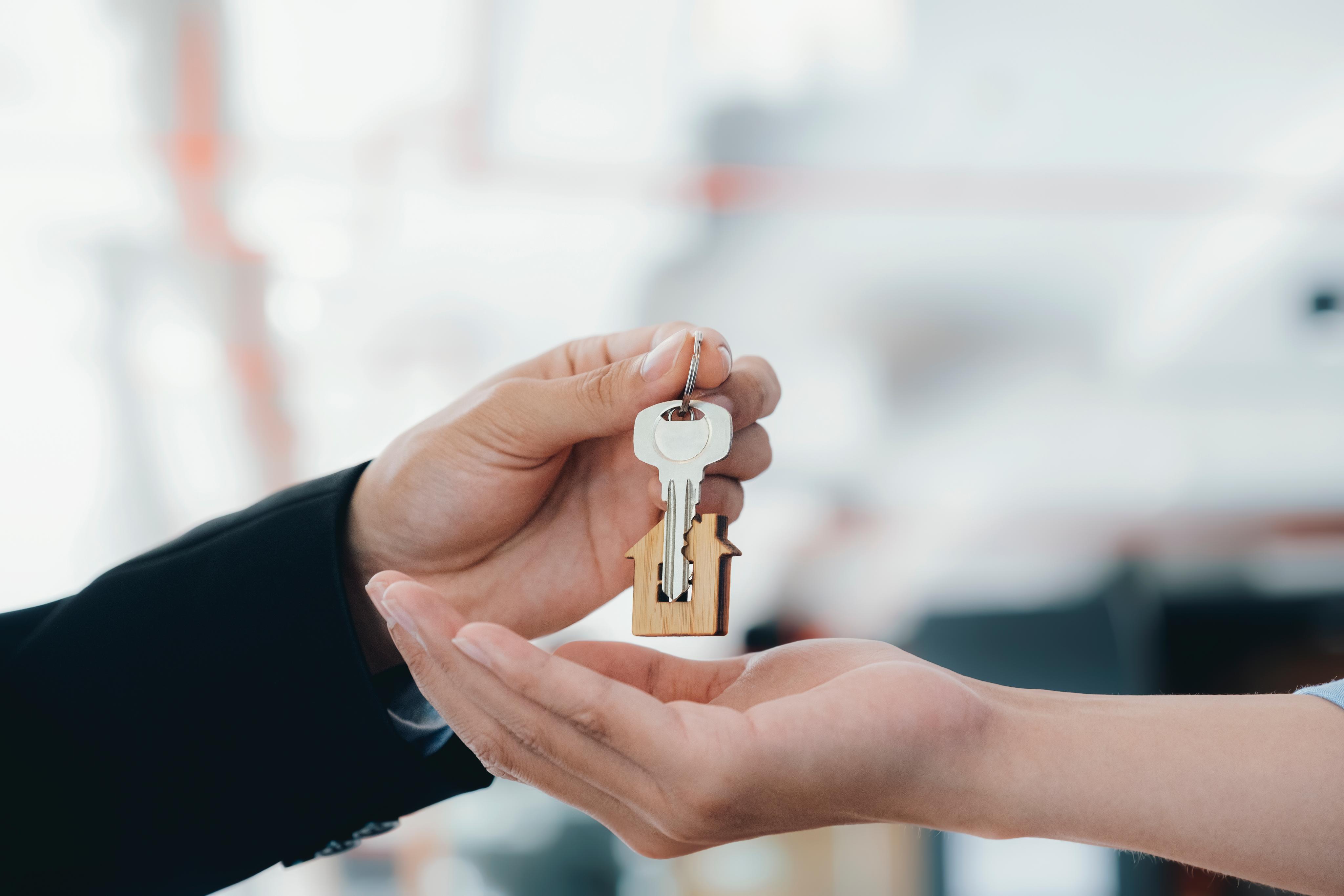 real estate agent holding key